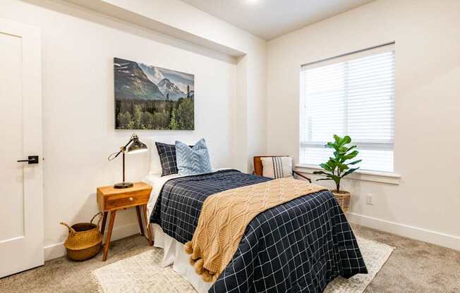 bedroom with a bed and a window