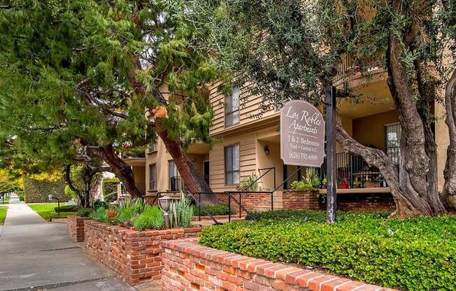 Welcoming Property Sign Green Space at Los Robles Apartments, Pasadena