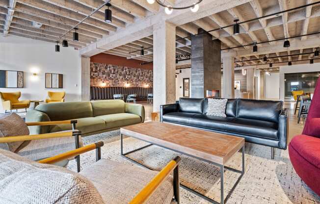 a living room with couches and a coffee table