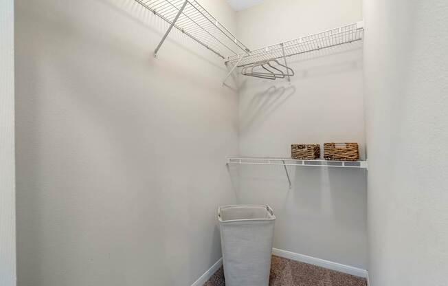 A Spacious Walk-In Closet with built in shelving