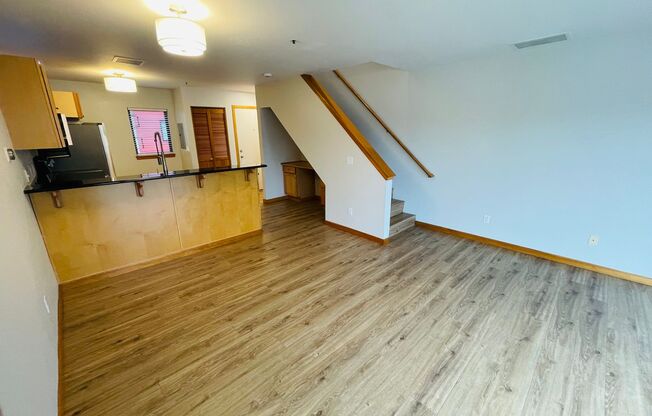 Top Floor 1bdrm Condo with River Views and Private Deck | FREE reserved parking Included!