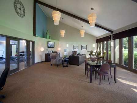 Clubhouse with sitting areas at L'Estancia, Sarasota