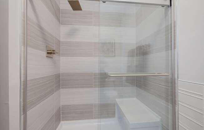 Brand new walk in shower, with bench, in select homes at Evergreens at Columbia Town Center