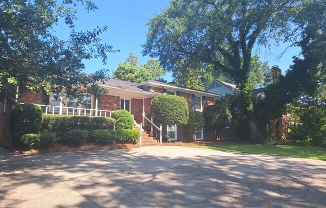 Magnificent Four Bedroom Home - Minutes Away from Numerous Attractions!