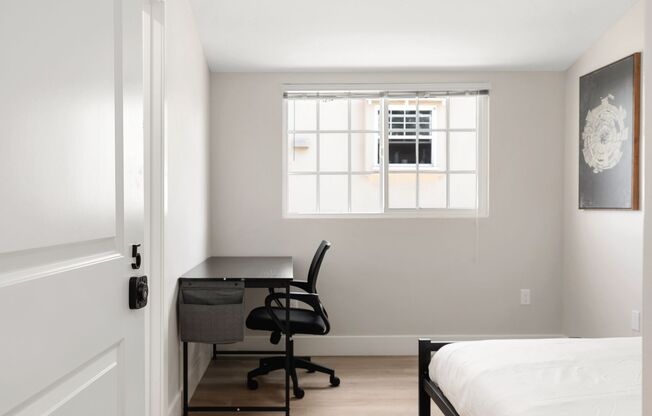 A 6 Bedroom, 6 Bathroom apartment with common areas and a fully functional kitchen at 1709 Kelton Ave.