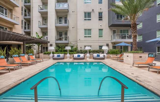 Resort-Style Swimming Pool with Sundeck Cabanas at South Park by Windsor, Los Angeles, California