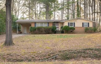 3 Bedroom Durham Home with Fenced in Yard & Carport in Durham's Knollwood