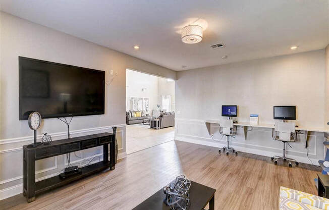 Residence at North Penn entertainment room with computers and television