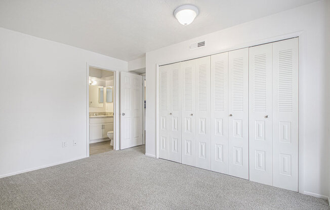 bedroom with walk-in closet and a bathroom at North Pointe Apartments, Indiana