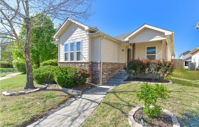 Adorable Rock and Siding one story home in sought after Harvest Bend subdivision in Frisco ISD