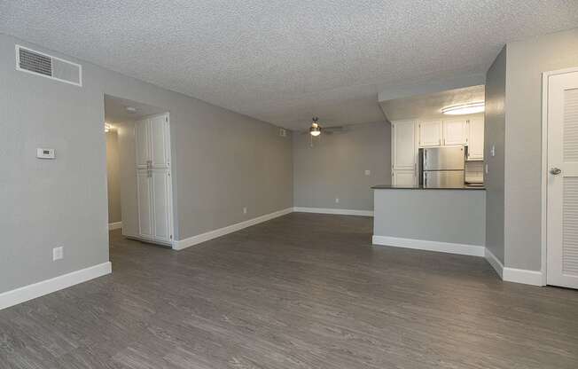 Living and dining area near kitchen l Vue at the Lake in Sacramento