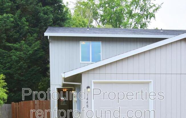 1448 NE THOMAS CT