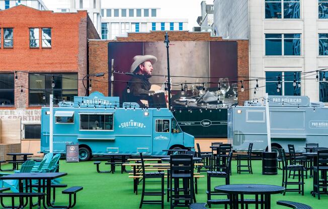 Just outside Modera McGavock, local food trucks and outdoor dining bring bold flavor and community energy to Nashville Yards.