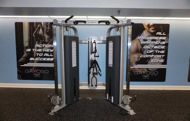a pair of exercise machines in a gym