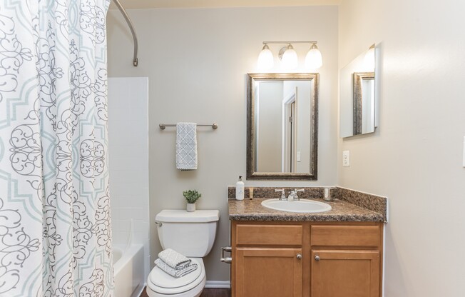 Step into the modern elegance of Eagle Rock Apartments at Columbia. This stylish bathroom features sleek finishes and plenty of space for your daily routine. Discover your perfect retreat—schedule a visit today!