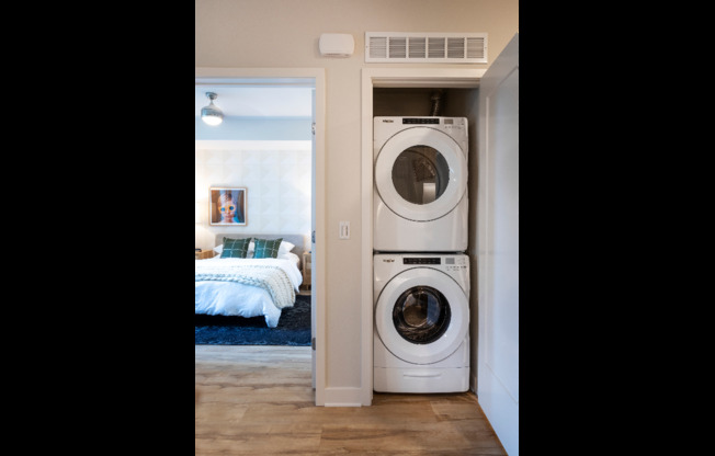 Full-sized stackable washer and dryer in all homes