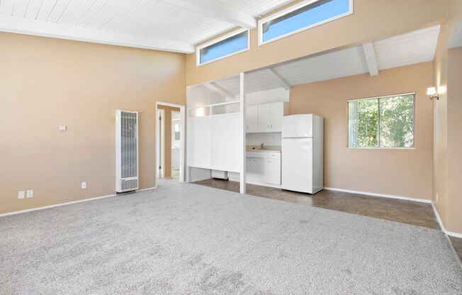 Vaulted Ceilings and Berber Carpet Los Angeles Apartment