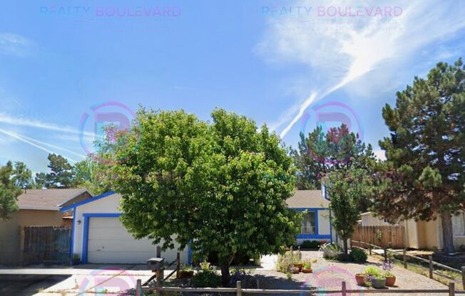 Bright & Spacious 3-Bedroom Home in North Valleys with Cozy Fireplace & Covered Patio!