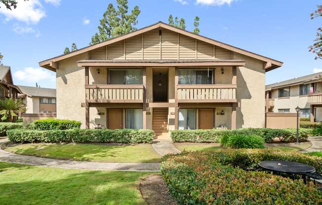 a house with a yard in front of it