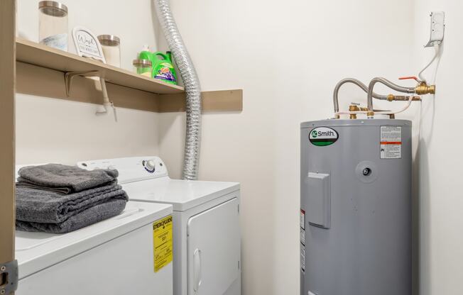 Laundry room with a washer and dryer at Lofts of Wilmington, Wilmington, NC