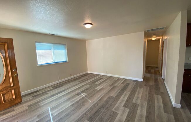 Renovated 3 Bed Home with a New Kitchen, Paint & Laminate Flooring!