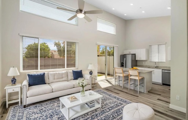 a living room with a couch and a table