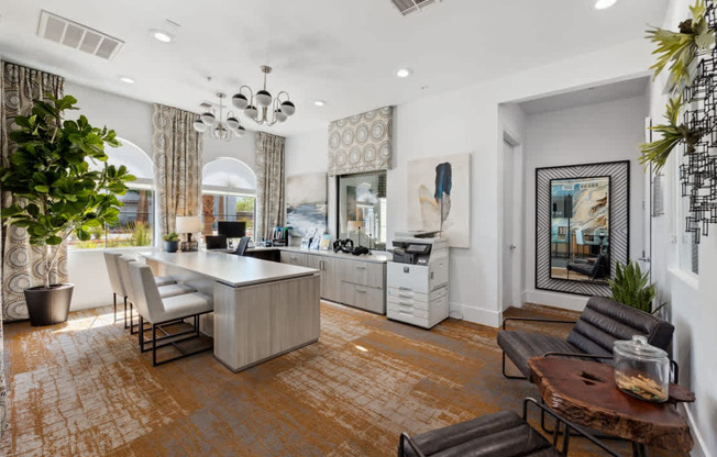 A modern kitchen with a dining table and chairs.