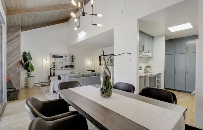 Tranquil Top-Floor End Unit with Stream Views & Resort Amenities — Blocks to Downtown