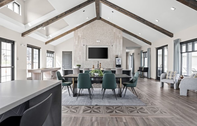 a large dining room with a large table and chairs