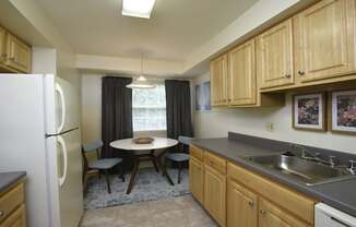 Kitchen with eat-in dining  table and window
