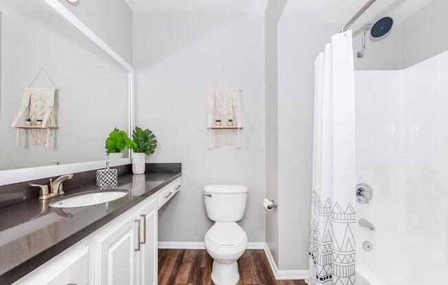 a room with a sink and a mirror