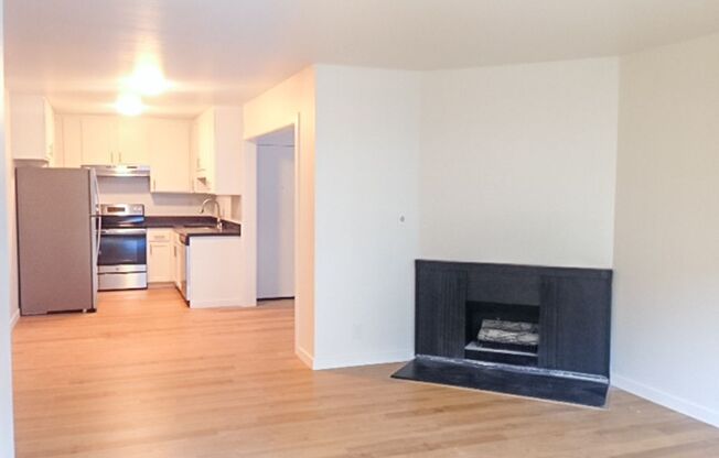 Stunning Remodeled 2BR/2BA Flat! Fireplace! Parking! Laundry! -PROGRESSIVE