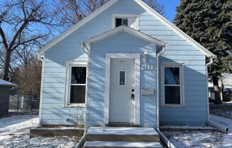 Cozy Central Sioux Falls Home with Modern Updates and Year-Round Charm!