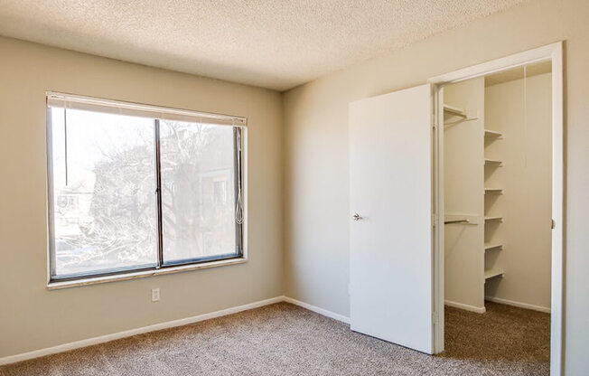 bedroom with closet in Aurora, CO
