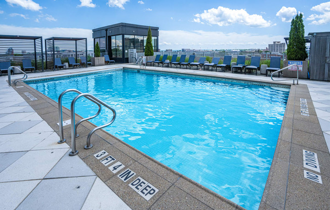 Heated rooftop pool with skytop cabanas