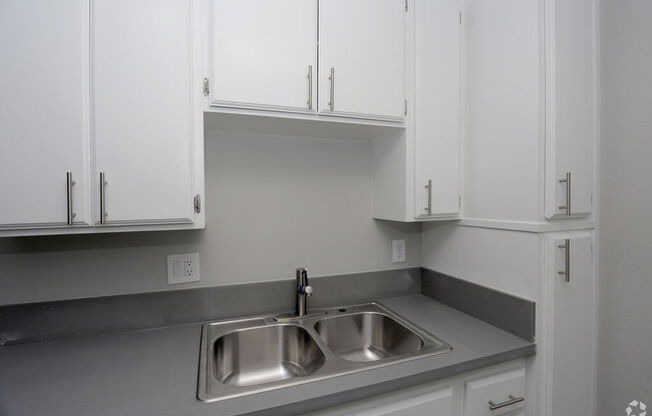 Sink With Faucet at The Marq Apartments LLC, Los Angeles