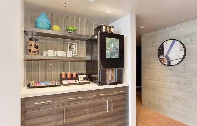 Leasing Office Beverage Station with Coffee Maker, Cabinets, Dog Treat Jar, and Candy Tray