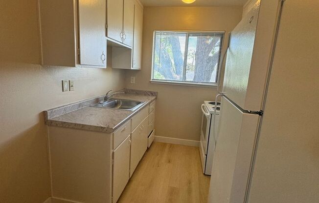 Upstairs 1 bedroom 1 bath apartment w/ assigned parking!