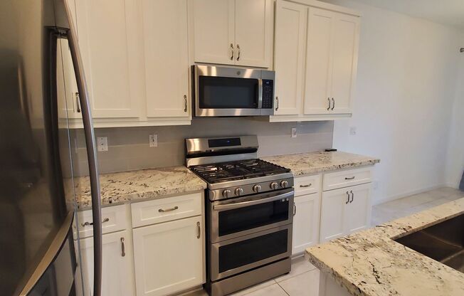 Beautiful townhome features a bright, open-concept layout