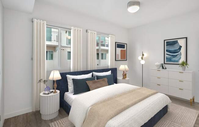 a bedroom with a bed and a window with white curtains