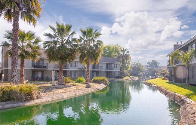 Lake With Lush Natural Surrounding at Edgewater Isle Apartments & Townhomes, Hanford, California