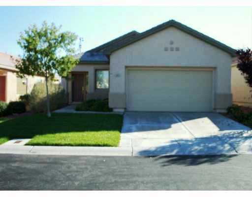 Wonderful Summerlin single story with grass backyard and island kitchen.