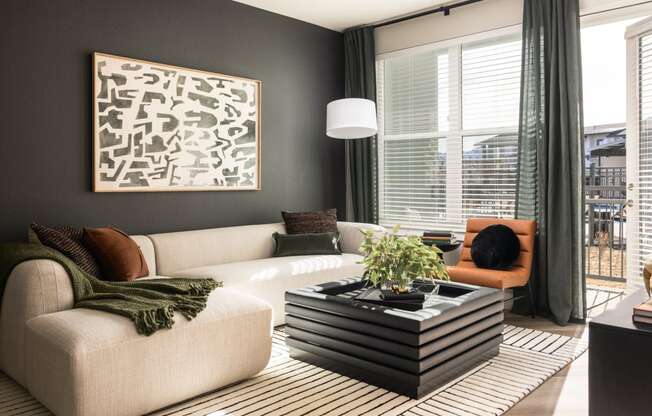 a living room with a couch and a coffee table