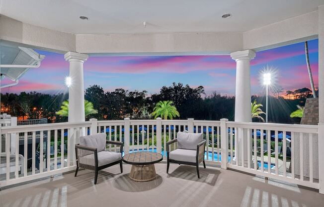 Private patio overlooking the resort style swimming pool
