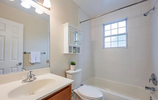 Spacious 1 + 1 Condo in quiet walk up Bldg.
