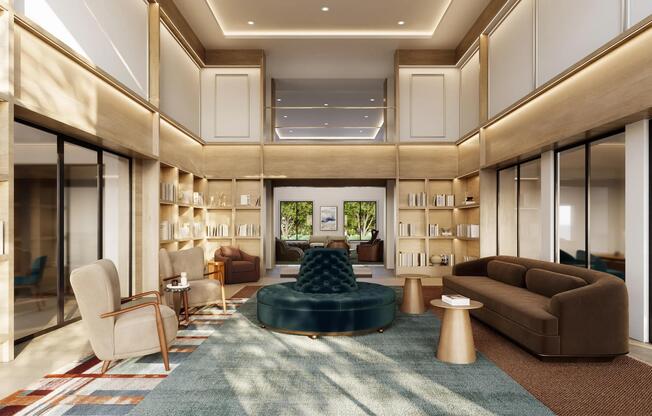 The clubroom features double-height ceilings, curated lounge seating, built-in library shelving, private meeting spaces, and sophisticated design elements that create a welcoming environment for gathering, working, and relaxing.