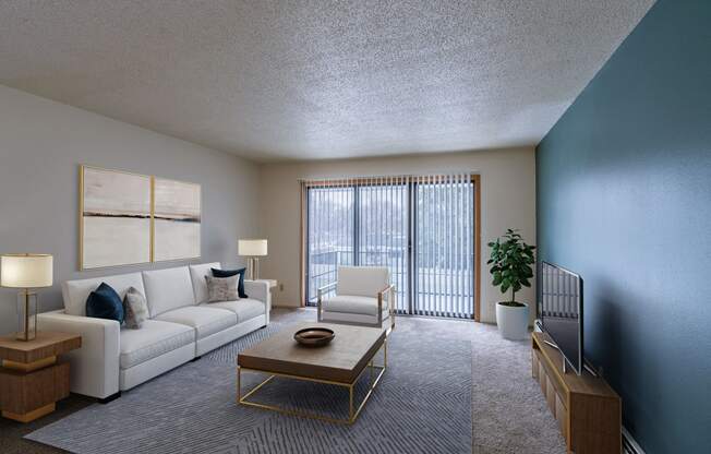 a living room with a couch and a table. Fargo, ND Betty Ann Apartments