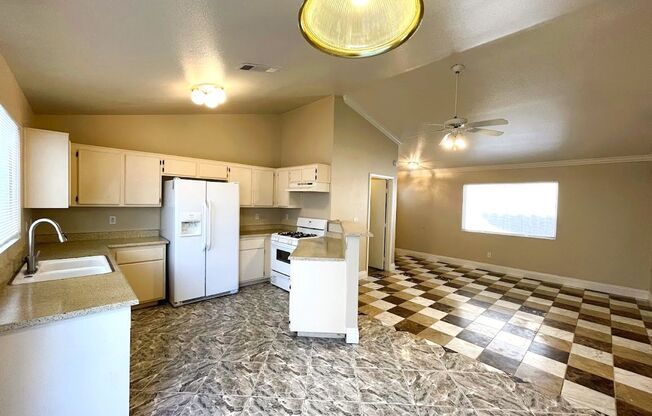 A SPACIOUS SINGLE STORY WITH TILE FLOORING, 3 BEDROOM & 2 BATH HOME LOCATED NEAR THE NELLIS AIR FORCE BASE WITH NEARBY SHOPPING CENTERS AND FAMILY PARK. MINUTES AWAY FROM THE I-15 FREEWAY!
