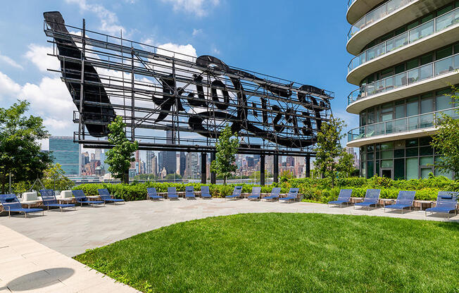 Iconic Pepsi Cola sign in Long Island City with large private sun deck for TFC residents. 