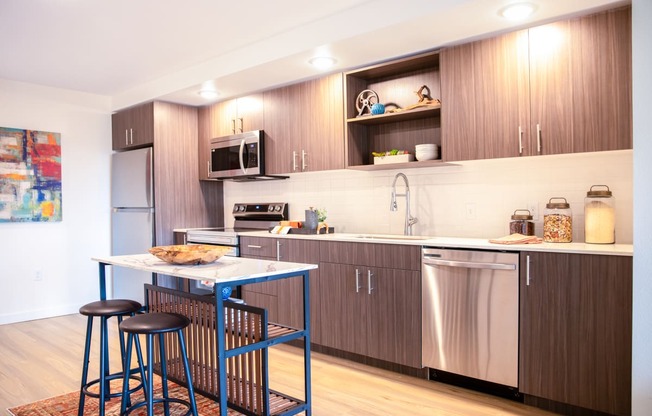a kitchen with a small table and two stoolsat Scouter's Mountain, Happy Valley, 97086